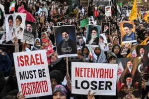 Manifestantes en Teherán muestran su rechazo a la intervención extranjera tras cumplirse dos semanas de conflicto.