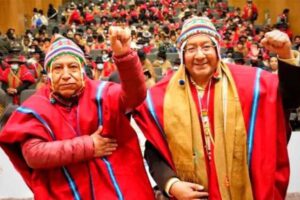 Luis Arce y Ponchos Rojos en reunión