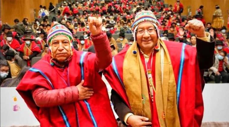 Luis Arce y Ponchos Rojos en reunión