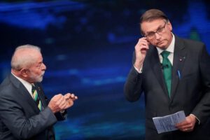 Lula da Silva y Jair Bolsonaro en un debate presidencial en Brasil