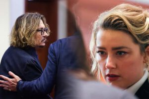 Amber Heard paga deuda a Johnny Depp
