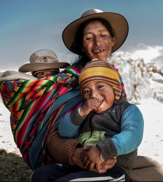 Una mujer y sus tres hijos