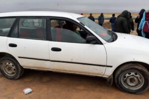 Hombre muerto dentro de un auto