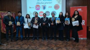 Los premiados junto a los representantes de JCI