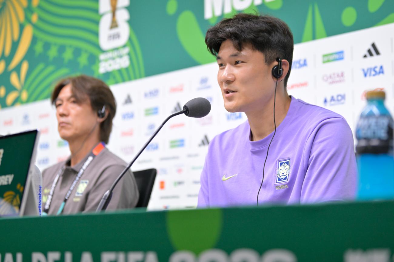 Hong Myung-bo y Kim Min-jae