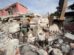 Un rescatista del Ejercito de México junto a su perro trabajan en un edificio afectado por los terremotos deñ pasado miércoles, en La Guaira (Venezuela).