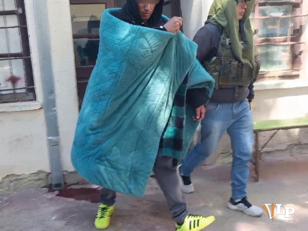 Detenido bajo custodia policial