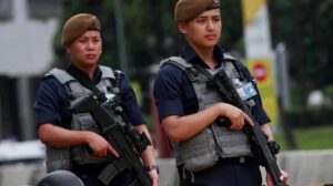 policía singapur