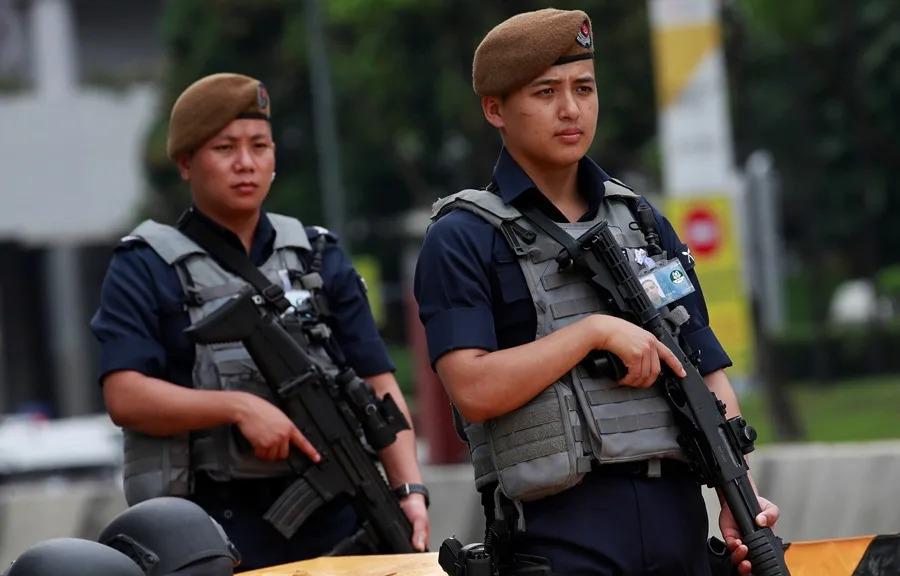 policía singapur