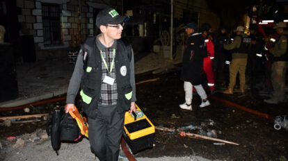 Personal de la Fiscalía y forenses realizando labores de recolección