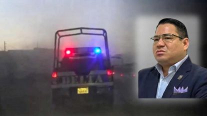 Una patrulla de la policía y Roger Mariaca