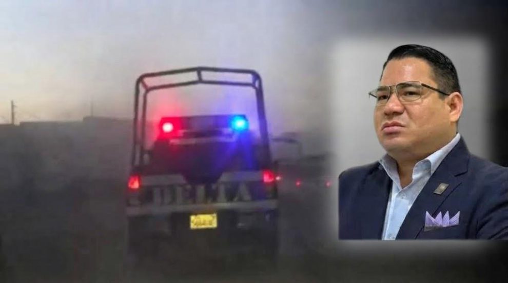 Una patrulla de la policía y Roger Mariaca